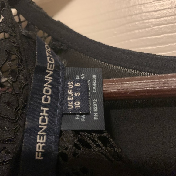 Sheer quarter sleeved Black lace top with tie in back. - Picture 6 of 8